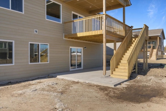 rear view of property featuring a patio