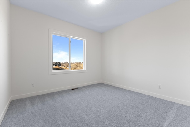 unfurnished room with carpet