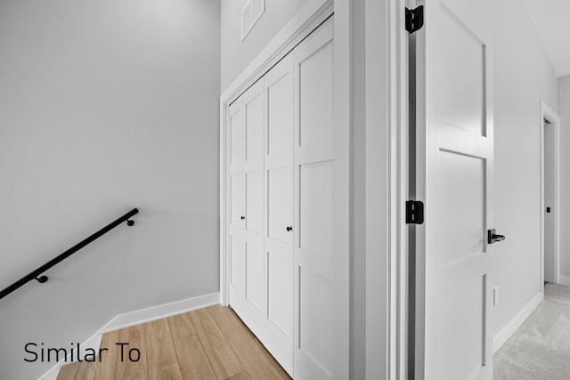 hallway featuring light hardwood / wood-style flooring