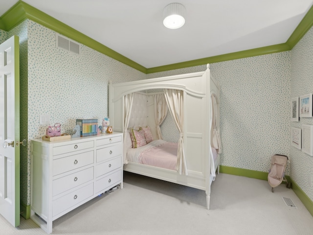 carpeted bedroom with crown molding