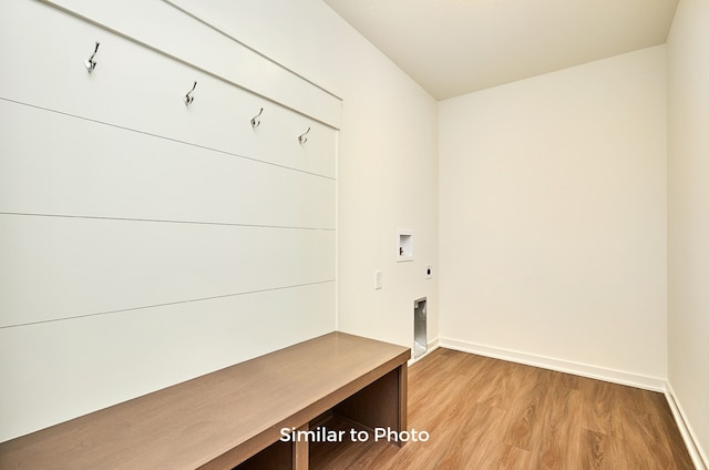 mudroom with wood-type flooring