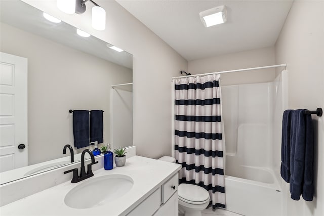 full bathroom with vanity, shower / bath combination with curtain, and toilet