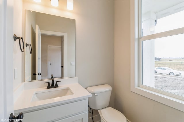 1109 Mulberry Dr NW, Bondurant, IA 50035 - bathroom with toilet and vanity