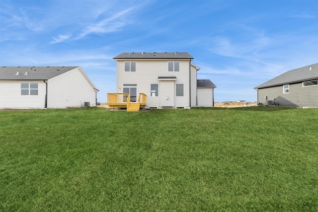 1109 Mulberry Dr NW, Bondurant, IA 50035 - back of property with a yard and central air condition unit