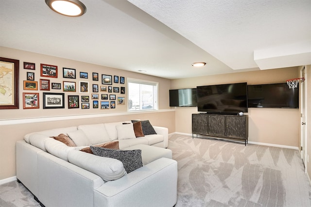 carpeted living room with a textured ceiling