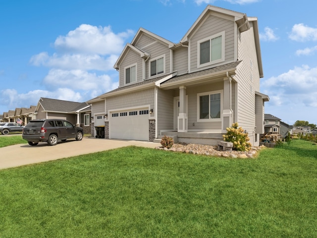 craftsman house featuring a front lawn, a garage, and a porch