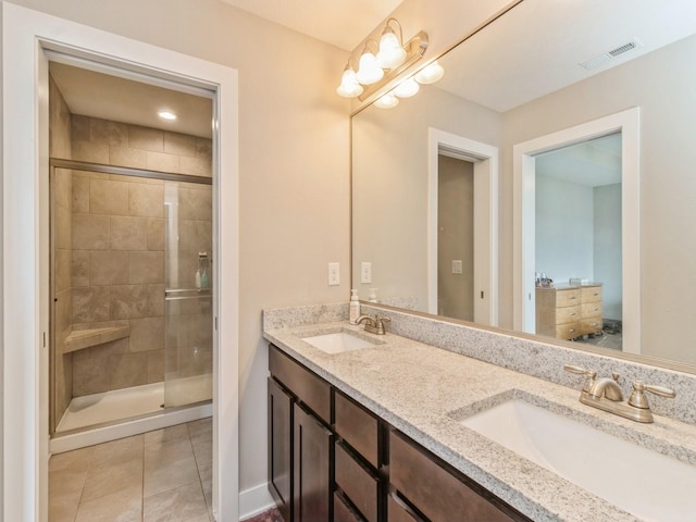 1401 S 10th St, Adel, IA 50003 - bathroom with a stall shower, double vanity, and tile patterned flooring
