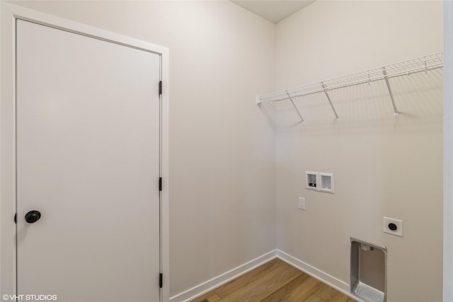 laundry room featuring electric dryer hookup, light wood-type flooring, and hookup for a washing machine