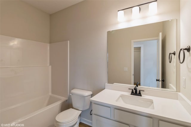 full bathroom featuring shower / washtub combination, vanity, and toilet