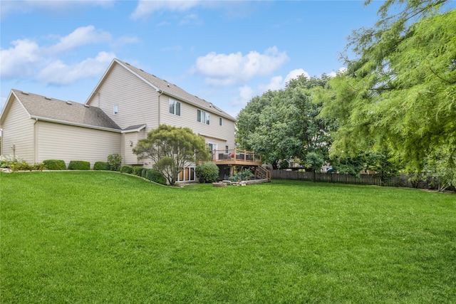 view of yard with a deck