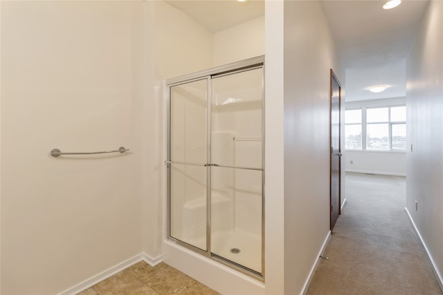 bathroom featuring walk in shower