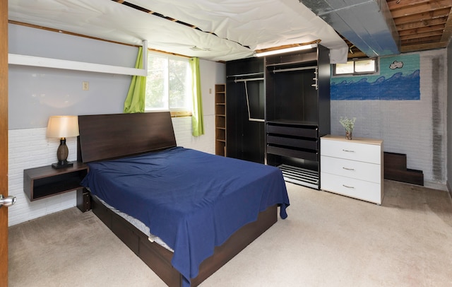 carpeted bedroom with a closet