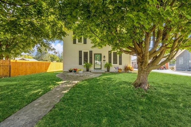 view of front of home with a front yard