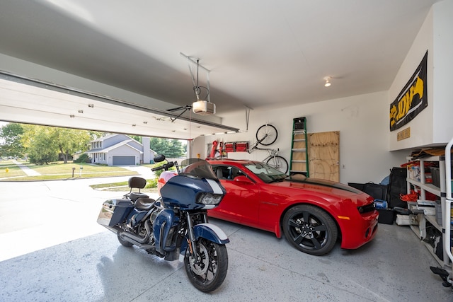 garage featuring a garage door opener