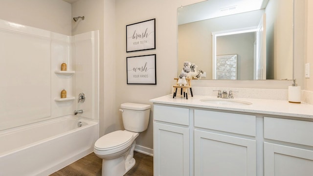 full bathroom featuring vanity, toilet, shower / bathing tub combination, and hardwood / wood-style flooring