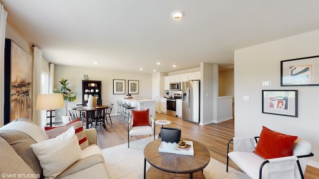 living room featuring light wood-type flooring