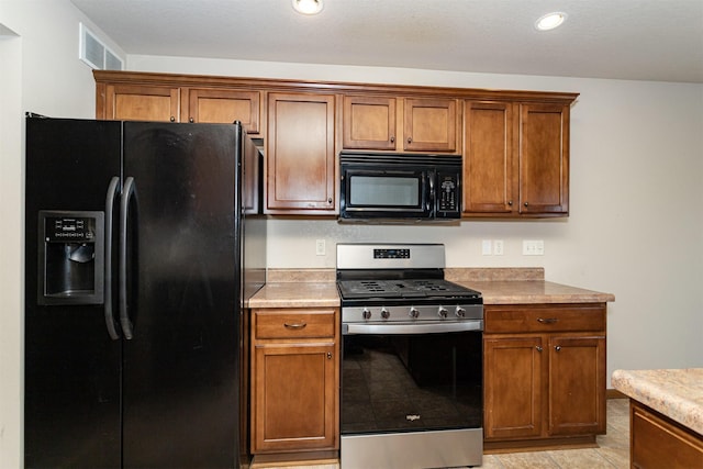 kitchen featuring black appliances