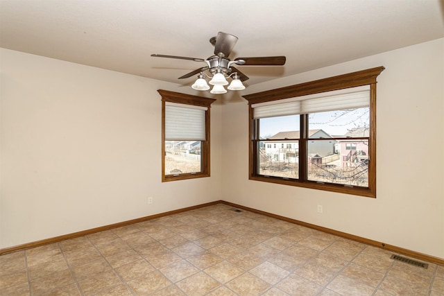 empty room with ceiling fan