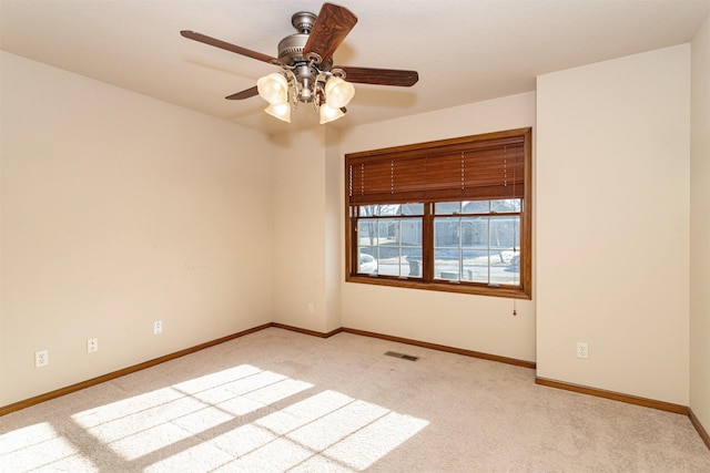 empty room with light colored carpet