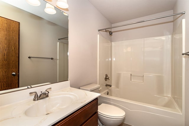 full bathroom featuring vanity, shower / washtub combination, and toilet