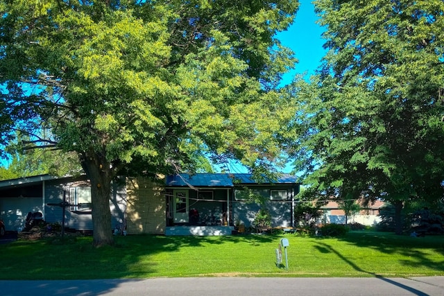 view of front of home with a front yard