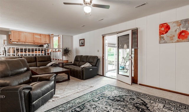 living room featuring ceiling fan