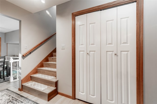 staircase featuring hardwood / wood-style floors