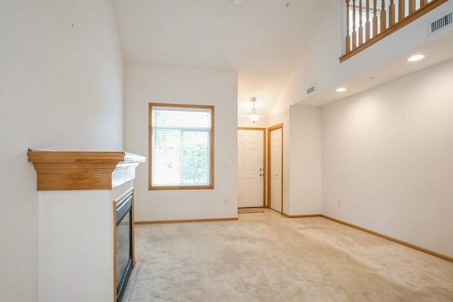 interior space featuring high vaulted ceiling