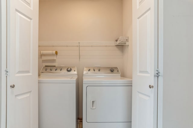 laundry room featuring independent washer and dryer