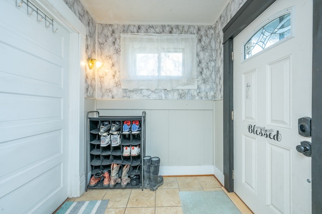 entrance foyer featuring light tile patterned flooring