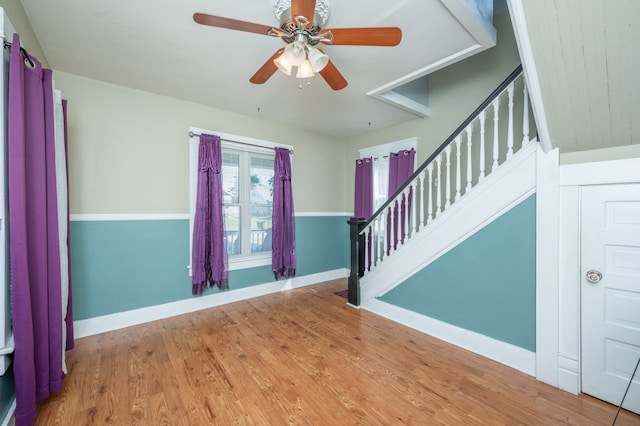 entryway with hardwood / wood-style flooring and ceiling fan