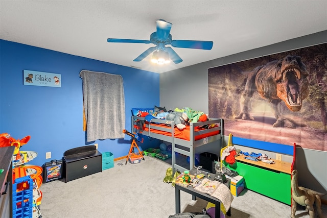 interior space with ceiling fan and carpet floors