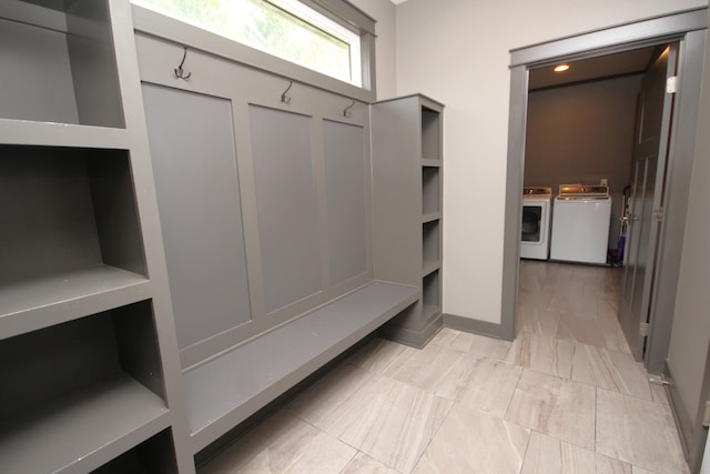 mudroom featuring separate washer and dryer