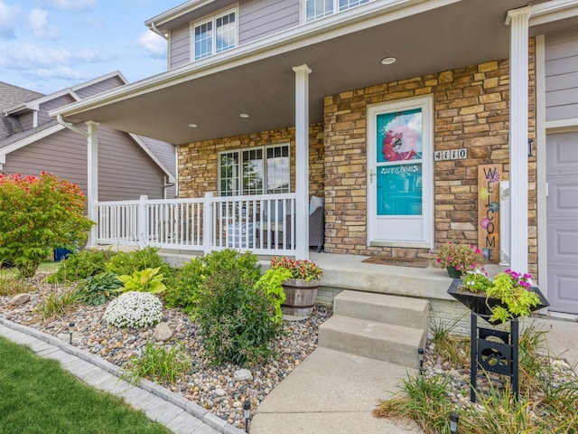 entrance to property with covered porch