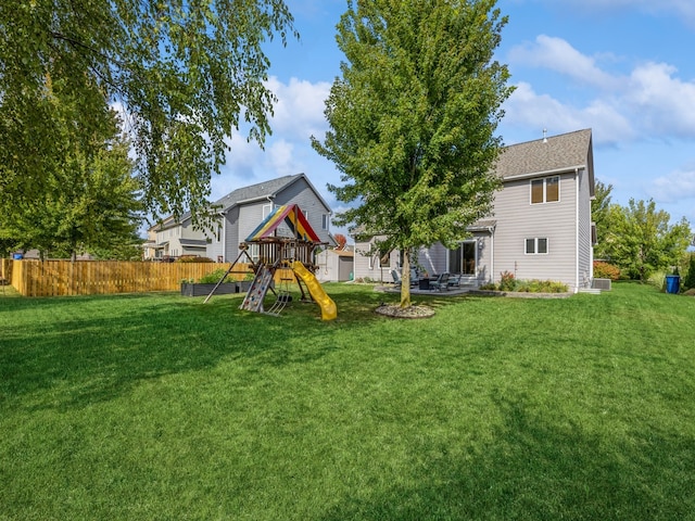 view of yard with a playground