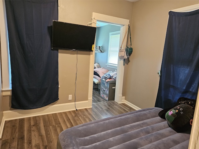 bedroom featuring hardwood / wood-style flooring