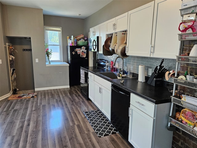 kitchen featuring black appliances, decorative backsplash, white cabinetry, and dark hardwood / wood-style floors