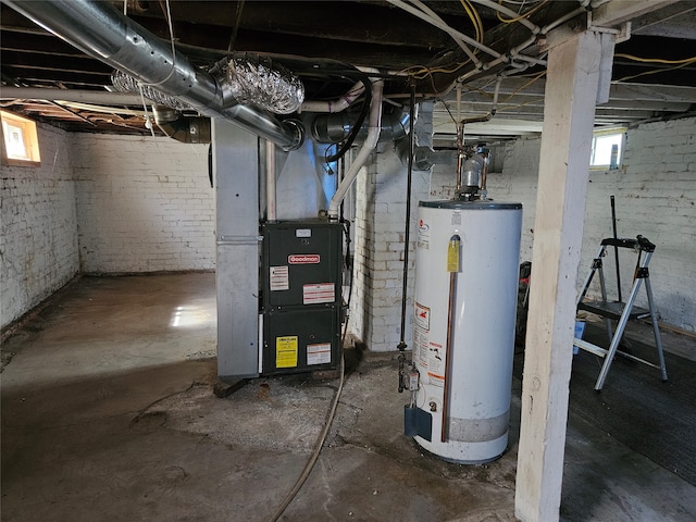 basement featuring heating unit and water heater