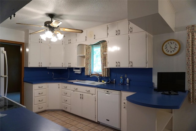 kitchen featuring a sink, white cabinets, white appliances, a textured ceiling, and open shelves