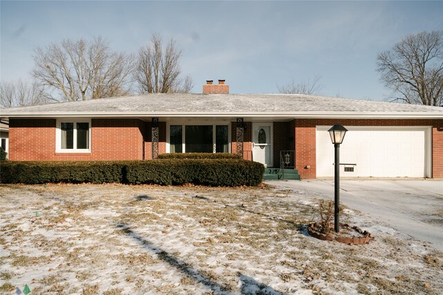 single story home featuring a garage