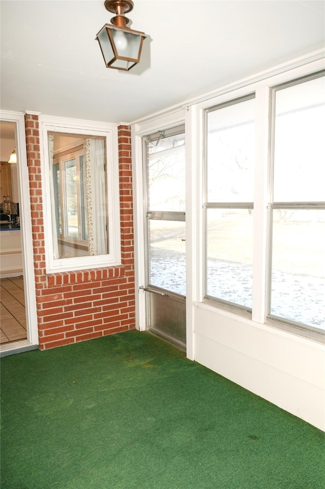 view of unfurnished sunroom