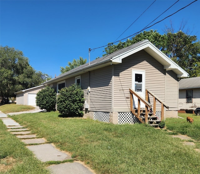 view of property exterior with a lawn and a garage