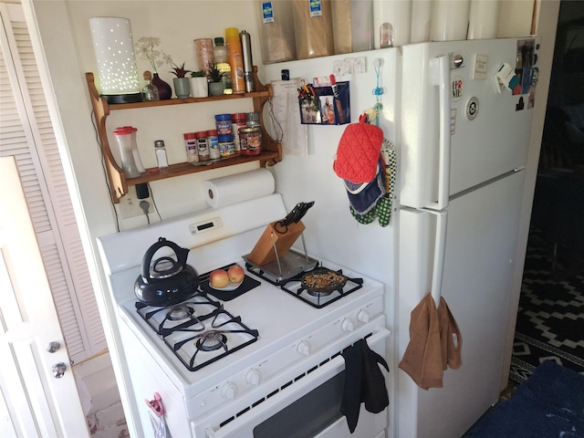 kitchen with white appliances and open shelves