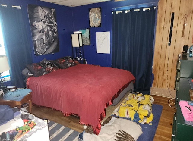 bedroom featuring wood finished floors
