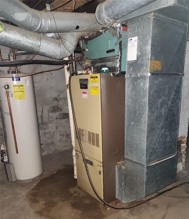 utility room featuring water heater and heating unit
