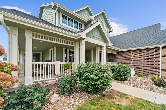 view of front of property featuring covered porch