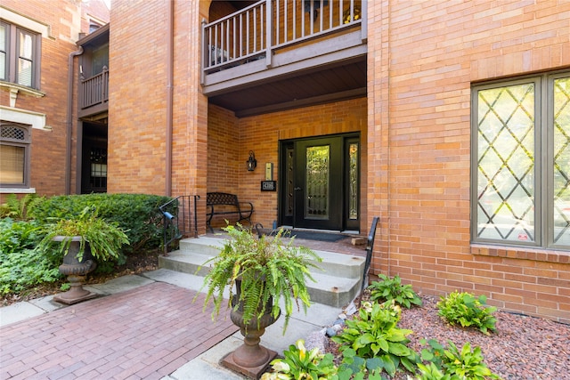 property entrance with a balcony