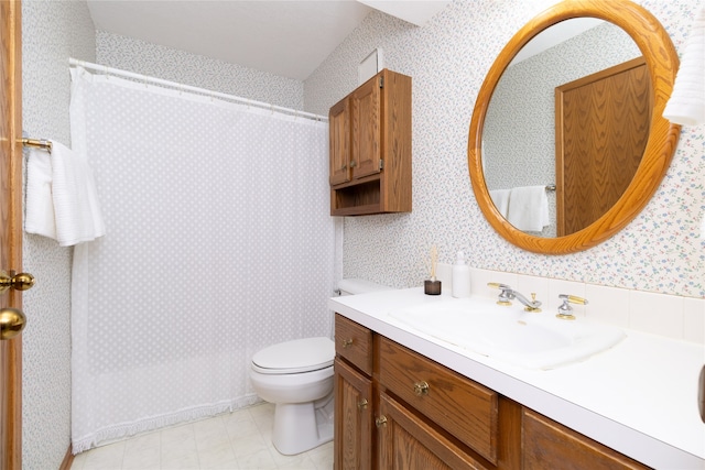 bathroom with vanity, toilet, and a shower with shower curtain