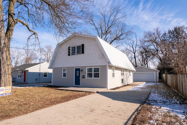 view of front of house featuring an outdoor structure and a garage