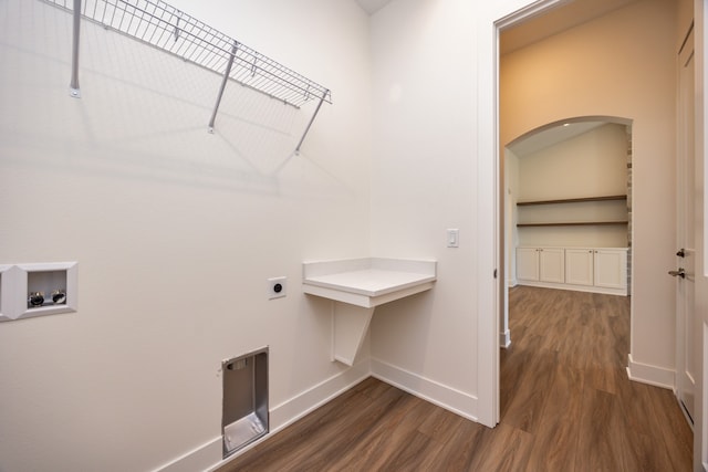 laundry room with dark hardwood / wood-style flooring, hookup for a washing machine, and electric dryer hookup